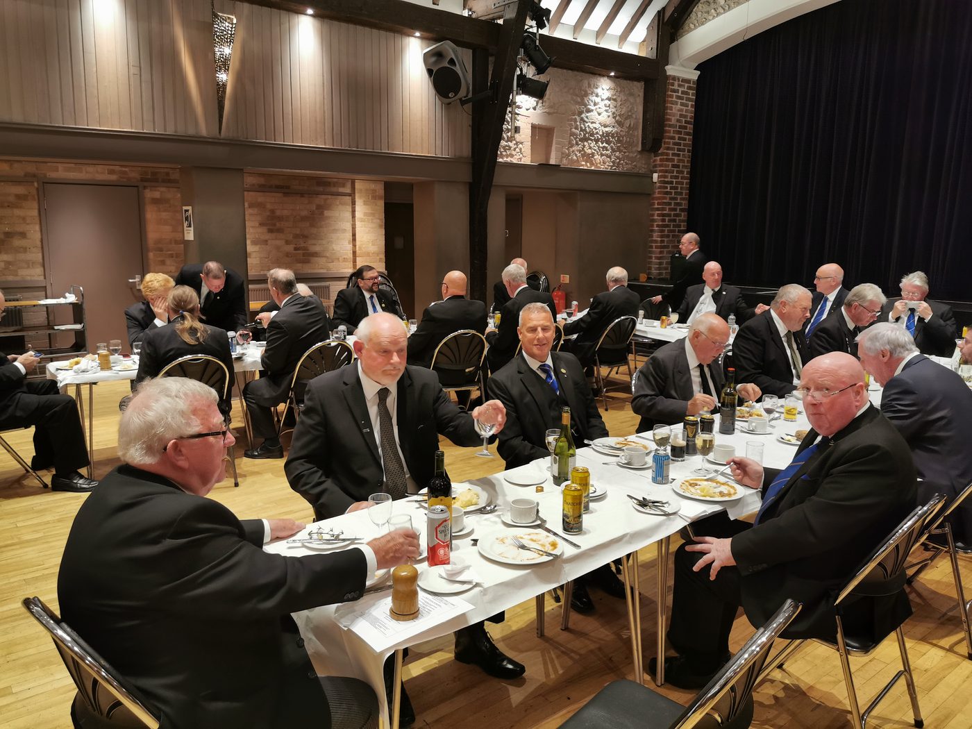 Members dining together after a lodge meeting