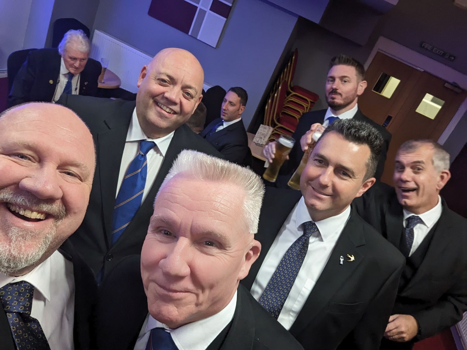Brethren of Ordinges Lodge sharing a drink after a meeting
